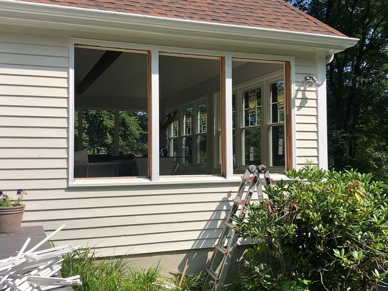 Porch with lots of double hung windows